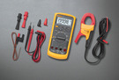 Combo kit with the Fluke 87V Industrial Multimeter, test leads with probes, alligator clips, i400 AC400A current clamp, 80BK-A thermocouple probe