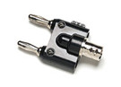 Converts a BNC scope lead to a dual banana plug for connection to a DMM. Required when adapting a shielded BNC cable, found on high-end low current clamps such as the Fluke 80i-110s, to a DMM.